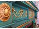 Close-up of the mantel showing the intricate gold leaf detail at 803 S Main St, Summerville, SC 29483