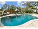 Gorgeous backyard pool with lounge chairs, offering a private retreat for relaxation and entertainment at 803 S Main St, Summerville, SC 29483