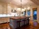 Well-appointed kitchen with a central island, modern appliances, and ample counter space at 83 Blue Heron Pond Rd, Kiawah Island, SC 29455