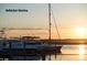 Bohicket Marina is a vibrant waterfront destination showcasing boats against a colorful sky at 83 Blue Heron Pond Rd, Kiawah Island, SC 29455