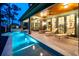 Stunning outdoor pool area with lounge chairs and lush landscaping, perfect for relaxation at 83 Blue Heron Pond Rd, Kiawah Island, SC 29455