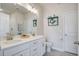 Bright bathroom featuring double sinks with white countertops and modern fixtures at 832 Descartes St, Summerville, SC 29486