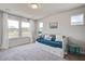 Bright bedroom features a daybed, coastal decor, and natural light at 832 Descartes St, Summerville, SC 29486