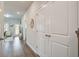 Hallway features hard wood floors, a closet, and a view of the home's exterior at 832 Descartes St, Summerville, SC 29486