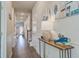 Hallway with decorative console table and doorway leading to the outside at 832 Descartes St, Summerville, SC 29486