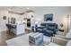 Open-concept living room and kitchen, perfect for entertaining and relaxation, with high end finishes at 832 Descartes St, Summerville, SC 29486