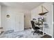 Home office with a built-in wardrobe, desk setup, and stylish decor at 832 Descartes St, Summerville, SC 29486