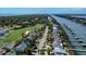 An aerial view of luxury waterfront homes located next to the golf course and waterway at 9 Intracoastal Ct, Isle of Palms, SC 29451