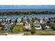 Beautiful aerial view of waterfront homes with lush surroundings and stunning water access at 9 Intracoastal Ct, Isle of Palms, SC 29451