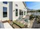Relaxing outdoor deck with comfortable seating and garden decor that provides a tranquil escape at 9 Intracoastal Ct, Isle of Palms, SC 29451