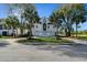 Inviting home featuring symmetrical design, well-kept lawn, and a welcoming entrance at 9 Intracoastal Ct, Isle of Palms, SC 29451