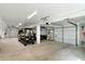 This bright garage boasts a wide garage door, utility storage, and plenty of space for vehicles at 9 Intracoastal Ct, Isle of Palms, SC 29451
