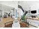 Open floor plan with a living room, dining area, and staircase for easy flow and entertaining at 9 Intracoastal Ct, Isle of Palms, SC 29451