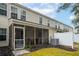 A screened porch adds charm to this home with its well-maintained backyard at 9118 Maple Grove Dr, Summerville, SC 29485