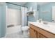 Bright bathroom featuring a tub and shower combination, vanity with storage, and modern fixtures at 9118 Maple Grove Dr, Summerville, SC 29485