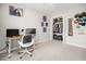 Carpeted bedroom featuring an open closet, light grey walls, and a desk and computer with white office chair at 9118 Maple Grove Dr, Summerville, SC 29485