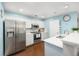 Modern kitchen with stainless steel appliances, subway tile backsplash and ample counter space at 9118 Maple Grove Dr, Summerville, SC 29485