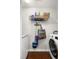 Functional laundry room with washer, dryer and shelving for storage at 9118 Maple Grove Dr, Summerville, SC 29485