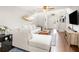 Bright and airy living room with hardwood floors, stylish decor, a comfortable sectional sofa, and modern furnishings at 9118 Maple Grove Dr, Summerville, SC 29485