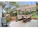Spacious backyard deck with a pergola, dining set, and seating area, perfect for outdoor gatherings at 935 Lansing Dr, Mount Pleasant, SC 29464
