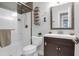 Modern bathroom with a glass-enclosed shower, sleek vanity, and neutral color palette at 935 Lansing Dr, Mount Pleasant, SC 29464