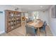 Elegant dining area featuring a wooden table, display cabinet, and stylish decor, perfect for gatherings at 935 Lansing Dr, Mount Pleasant, SC 29464