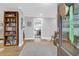 Bright entryway featuring hardwood floors, built in bookshelves, and neutral decor at 935 Lansing Dr, Mount Pleasant, SC 29464