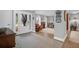 Open-concept living room featuring hardwood floors, lots of natural light and neutral colors at 935 Lansing Dr, Mount Pleasant, SC 29464