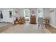 Bright living room with hardwood floors, many windows, and neutral decor at 935 Lansing Dr, Mount Pleasant, SC 29464