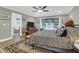 Spacious main bedroom featuring a TV, a large window, and wood floors at 935 Lansing Dr, Mount Pleasant, SC 29464