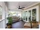 Inviting covered porch with comfortable seating, ceiling fan, and sliding glass doors at 935 Lansing Dr, Mount Pleasant, SC 29464