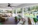 Relaxing covered porch overlooking a well-manicured backyard, perfect for outdoor enjoyment at 935 Lansing Dr, Mount Pleasant, SC 29464