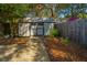 Exterior view of a storage shed with double doors, surrounded by a gravel and mulch landscape at 935 Lansing Dr, Mount Pleasant, SC 29464