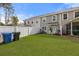 Well-manicured fenced backyard with patio area for outdoor enjoyment at 9727 Transplanter Cir, Ladson, SC 29456