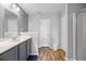 Bathroom featuring gray walls, wood floors, and a white shower at 9727 Transplanter Cir, Ladson, SC 29456