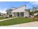 Stunning clubhouse with modern architecture, lush landscaping, and convenient community amenities at 9727 Transplanter Cir, Ladson, SC 29456