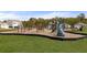 Large community playground featuring multiple play structures and equipment for enjoyment at 9727 Transplanter Cir, Ladson, SC 29456
