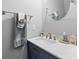 Stylish powder room featuring a modern vanity, elegant mirror, and neutral decor at 9727 Transplanter Cir, Ladson, SC 29456