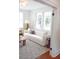Bright living room with large windows, modern sofa, and stylish decor at 10 Killians St, Charleston, SC 29403