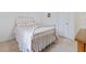 Bedroom with a metal frame bed and neutral decor offers a cozy and inviting space at 1003 Mountain Pine Rd, Moncks Corner, SC 29461