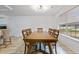 Dining room with large wood table, seating for six, and bright natural light at 1003 Mountain Pine Rd, Moncks Corner, SC 29461