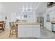 Open concept kitchen island with seating and storage in a modern, well-lit space at 1003 Mountain Pine Rd, Moncks Corner, SC 29461