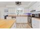 Bright kitchen featuring stainless steel appliances, white cabinetry, and ample counter space at 1003 Mountain Pine Rd, Moncks Corner, SC 29461