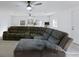 Spacious living room featuring a comfortable sectional sofa, bright lighting, and modern ceiling fans at 1003 Mountain Pine Rd, Moncks Corner, SC 29461