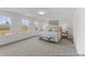 This is a main bedroom featuring neutral carpet, light fixture, windows and bed at 1005 Toland Dr # 44P, Saint George, SC 29477