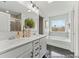 Bright bathroom with double sinks, sleek vanity, and a luxurious soaking tub at 1007 Toland Dr # 45P, Saint George, SC 29477