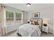 Inviting bedroom with a modern bed frame, bright windows, and calming neutral tones at 1007 Toland Dr # 45P, Saint George, SC 29477