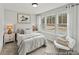 Serene bedroom featuring soft lighting, comfortable bedding, and a picturesque window view at 1007 Toland Dr # 45P, Saint George, SC 29477