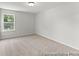 Inviting bedroom with neutral walls and carpeting bathed in natural light from a single window at 1009 Toland Dr # 46P, Saint George, SC 29477