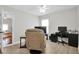 This bedroom features a sitting area, a ceiling fan, wood-look floors, and an open doorway at 106 Gathering Island Rd, Summerville, SC 29485